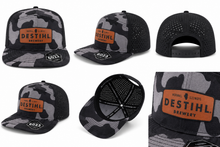 DESTIHL Brewery cap with camouflage and black designs.