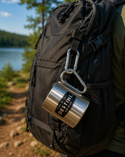 Black backpack with a carabiner mug attached