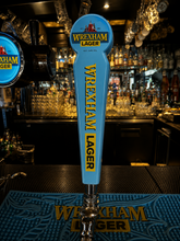 Wrexham Lager Tap Handle in a bar