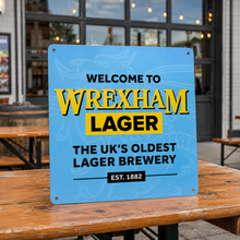 Wrexham Lager Tin Tacker outside of a pub